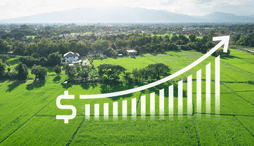 Aerial view of rural property showing graph of increasing dollar value