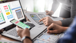 Web designers developing on accessible app