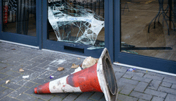 a broken storefront window