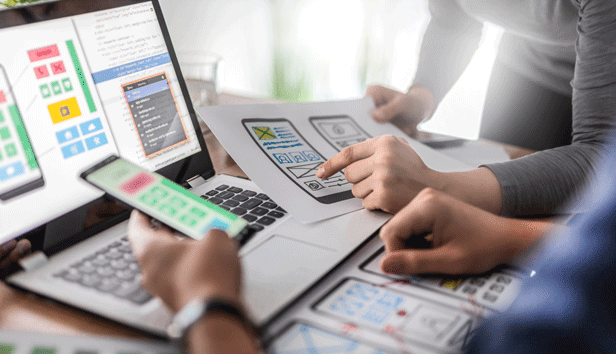 Web designers developing on accessible app